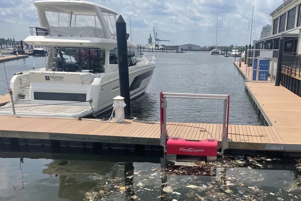 Collec’Thor fixed waste collector shown at use at a floating dock in Baltimore