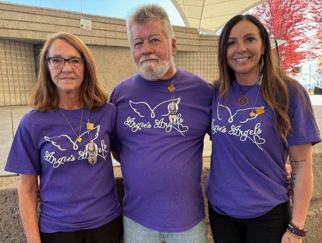 From left, Suzanne and Brian Sweeney Sr. attended the rally with Renee Buczel