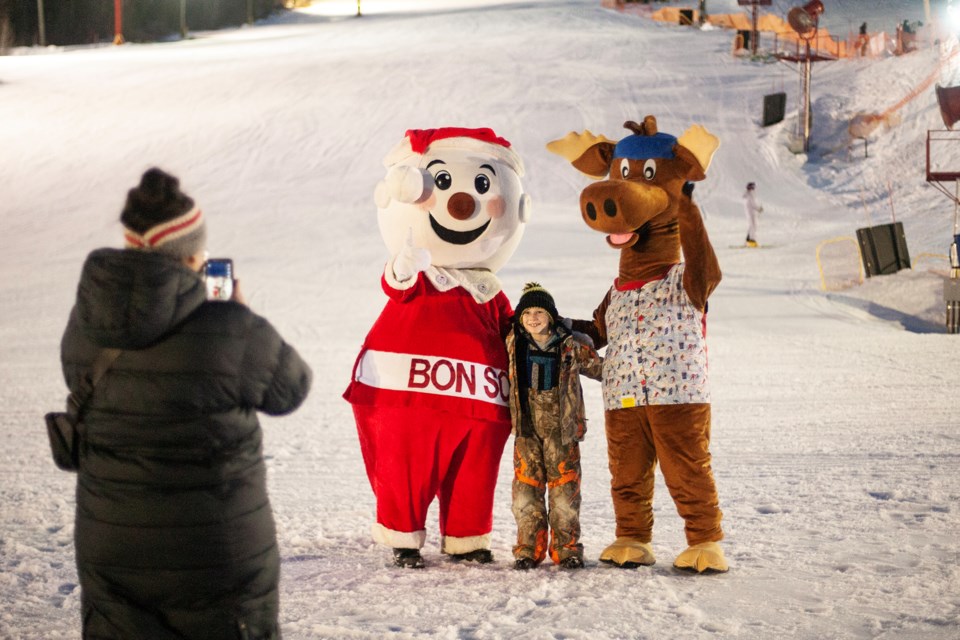 Mr. Bon Soo makes an appearance at the Bon Soo Rail Jam on Thursday with Searchmont Resort mascot Monty the Moose. Skiers and snowboarders were offered a reduced rate on lift tickets and rentals with a Bon Soo button.