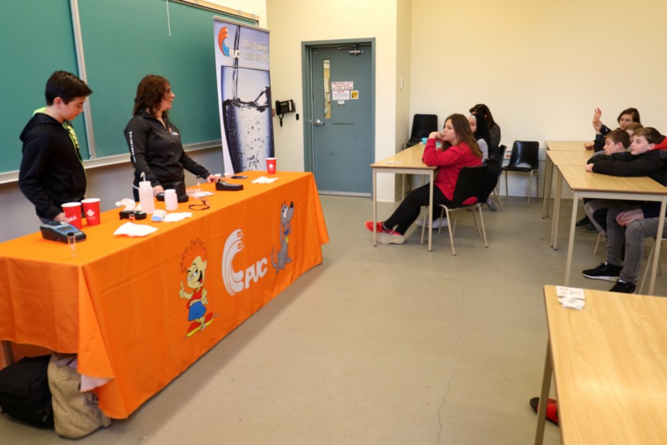 PUC water operations lead hand Sandra Dewar talks water treatment during the 12th annual Advanced Research and Technology Innovation Expo (ARTIE) at Algoma University Thursday. James Hopkin/SooToday