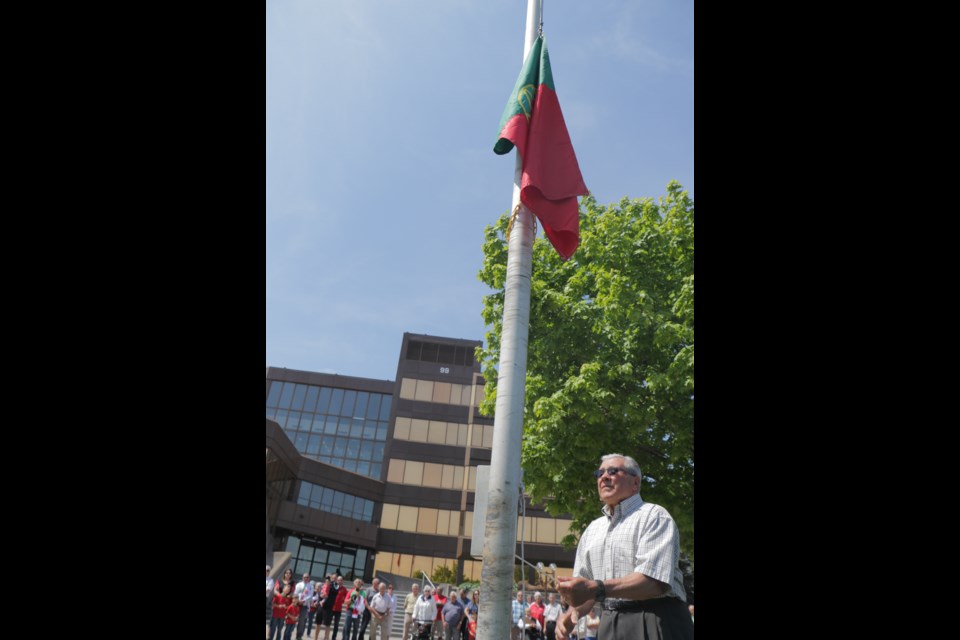 As the eldest member of the Canadian Portuguese Association, David Marques was asked to raise the Portuguese flag in front of city hall on Saturday during a celebration of Portugal Day. Photo by Jeff Klassen for SooToday