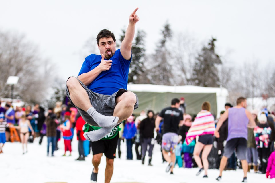 Crazy Canucks dove into the St. Marys River during the 2019 Bon Soo Polar Bear Swim. Donna Hopper/SooToday