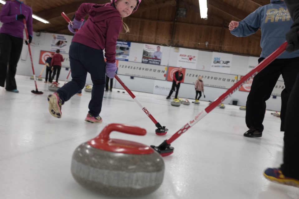 People enjoyed playing and learning about curling at the Community First Family Fun Spiel on Monday, the last day of Bon Soo. Photo by Jeff Klassen for SooToday