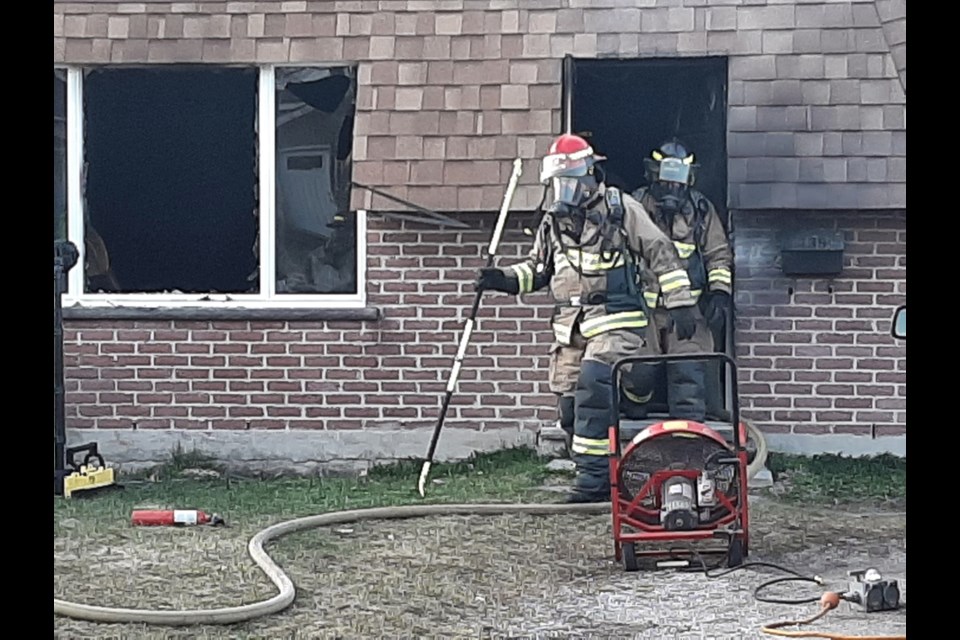 Firefighters and EMS crews responded to a house fire in the 100 block of Panoramic Drive early Saturday evening. Darren Taylor/SooToday