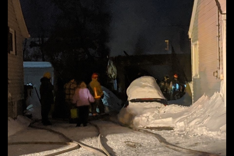 A garage at 315 Moody Street exploded in flames sending three people scrambling to get out on Monday evening. Carol Martin/SooToday