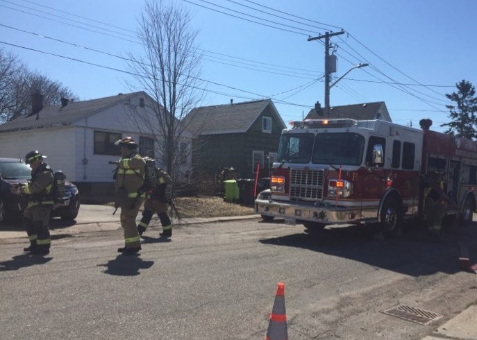 Reader submitted photo shows fire fighters on the scene at a house fire on Spruce Street Sunday morning.