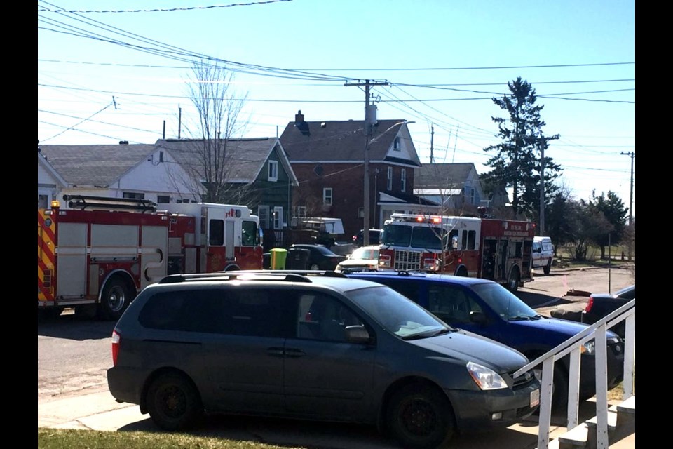 Reader submitted photo shows fire fighters on the scene at a house fire on Spruce Street Sunday morning.