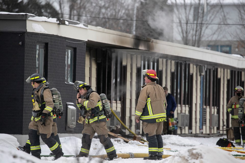 Firefighters respond to a fire at The Canuck on Thursday morning.