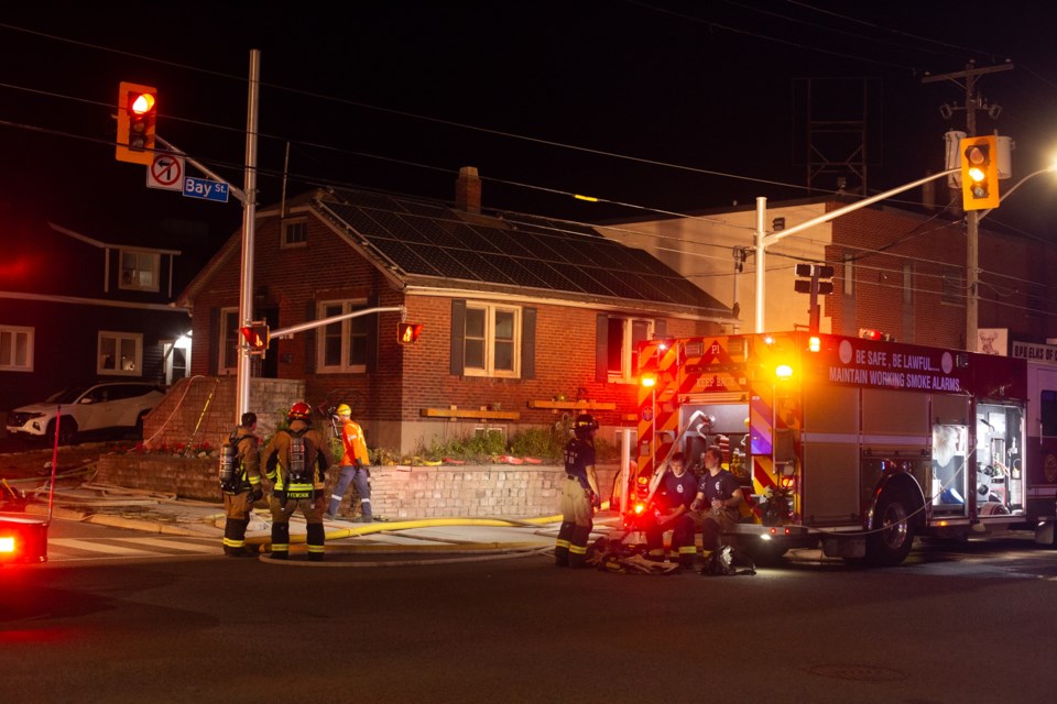 Firefighters on the scene of an apparent house fire Thursday, Sept. 26, 2024, on the 0-100 block of Dennis Street at the corner of Bay Street.