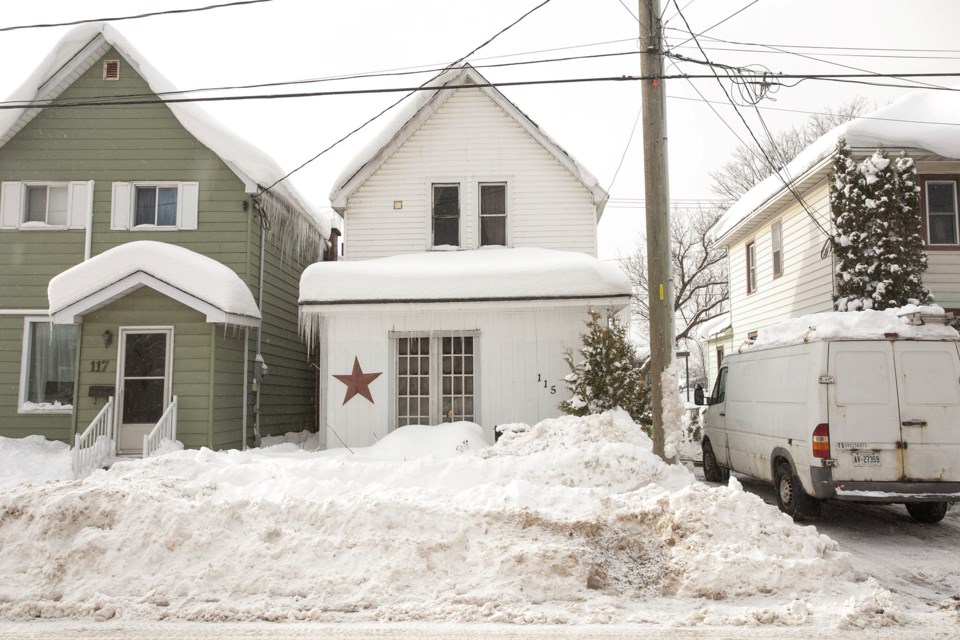 Relative calm in the 100-block of Grosvenor Avenue on Tuesday morning. Sault Ste. Marie Fire Services say smoke was visible from the two-storey structure Monday afternoon before it was extinguished.