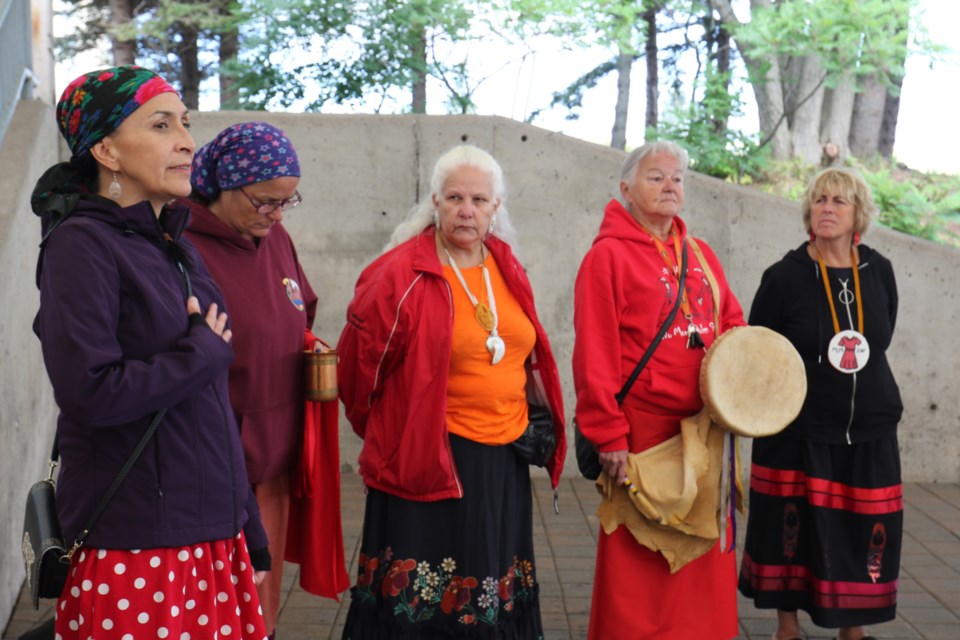 More than two dozen people gathered in downtown Sault Ste. Marie Tuesday afternoon for a prayer walk and vigil for the Indigenous women whose remains are believed to be in a Winnipeg landfill. The impromptu event also served as a way to remember and honour missing and murdered women locally.    