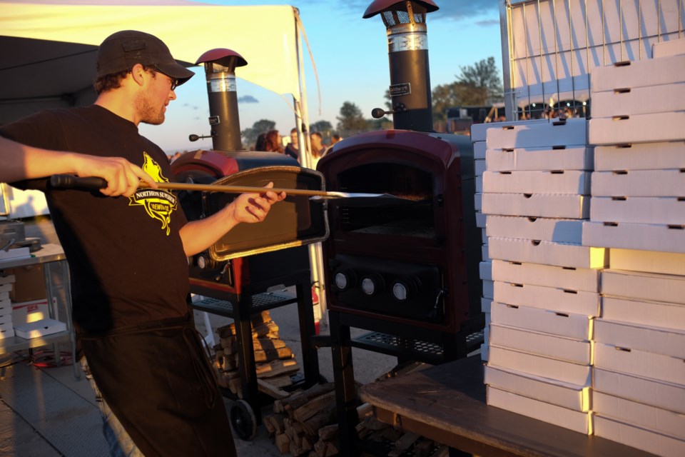 The Tech and Santini's Bistro are serving up personal-sized pizzas cooked in mini wood fire pizza ovens at The Yard. Photo by Jeff Klassen for SooToday