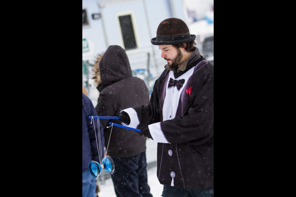 A juggler entertains at the Mill Market during the Bon Soo Winter Carnival on Saturday, February 7, 2015. Donna Hopper/SooToday