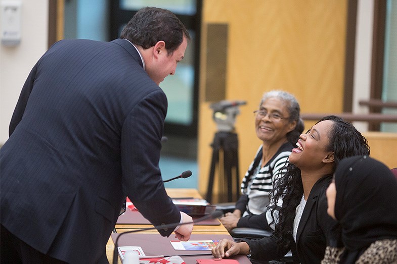 Mayor Christian Provenzano speaks with citizenship candidate Jennifer Joseph-Beckles immediately prior to a citizenship ceremony today at the Civic Centre. Kenneth Armstrong/SooToday