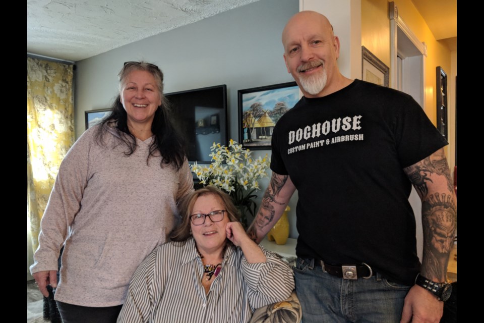 Sault veteran Kelley Westlake, centre, with sister Penny Westlake and artist/friend Dave Ostrowski-Gallant, March 27, 2019. Darren Taylor/SooToday