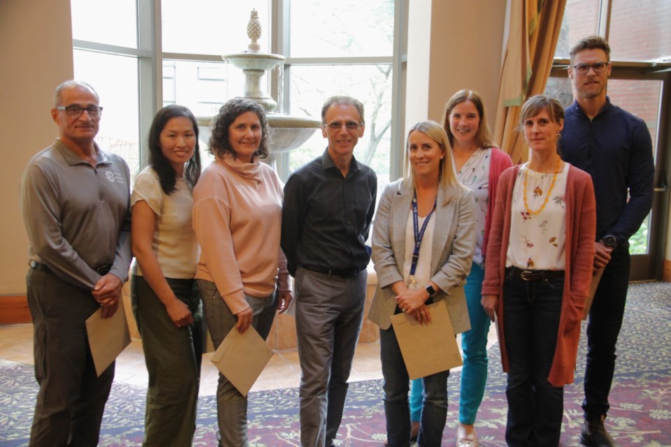 Group Health Centre family doctors Christopher Bruni, Win Yan Chung, Victoria Murdoch, Peter Maione, Megan Culina, Carolyn Kuntz, Adrianna Schamp and Blair Jarrett received Certificates of Recognition for exceptional dedication to patient care from the Ontario College of Family Physicians (OCFP) at The Water Tower Inn, Oct. 3, 2024. 