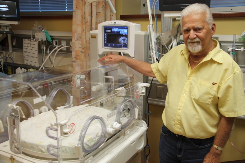 Mike Moore, owner/operator of Mike Moore Construction with a new incubator for babies that Moore purchased for Sault Area Hospital’s Neonatal Intensive Care Unit (NICU), August 28, 2024.