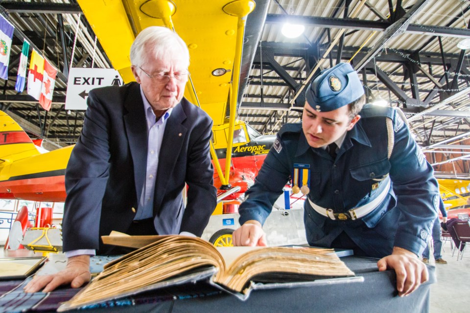 Warrant Officer Second Class Benn Fisher and former air cadet Bruce Caughill share stories and memories at the Canadian Bushplane Hertiage Centre on Thursday, Jan. 5, 2017. Donna Hopper/SooToday