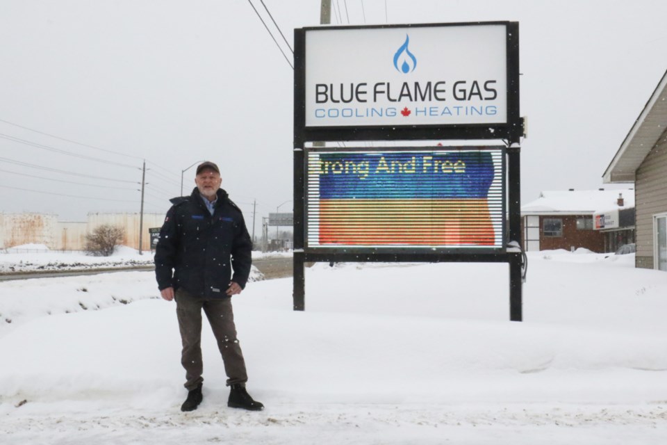 Blue Flame Gas owner Ray Clement is throwing his support behind Ukraine by incorporating the country's flag into the digital signage outside his Trunk Road business. 