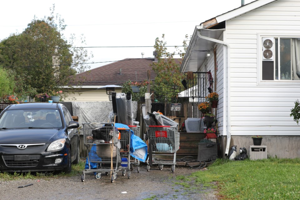 Neighbours of 29 Pentagon Blvd. have been awarded more than $500,000 in damages for living beside a garbage-strewn property allegedly overrun by drugs, violence and squatters in the otherwise family-oriented P-Patch neighbourhood. 