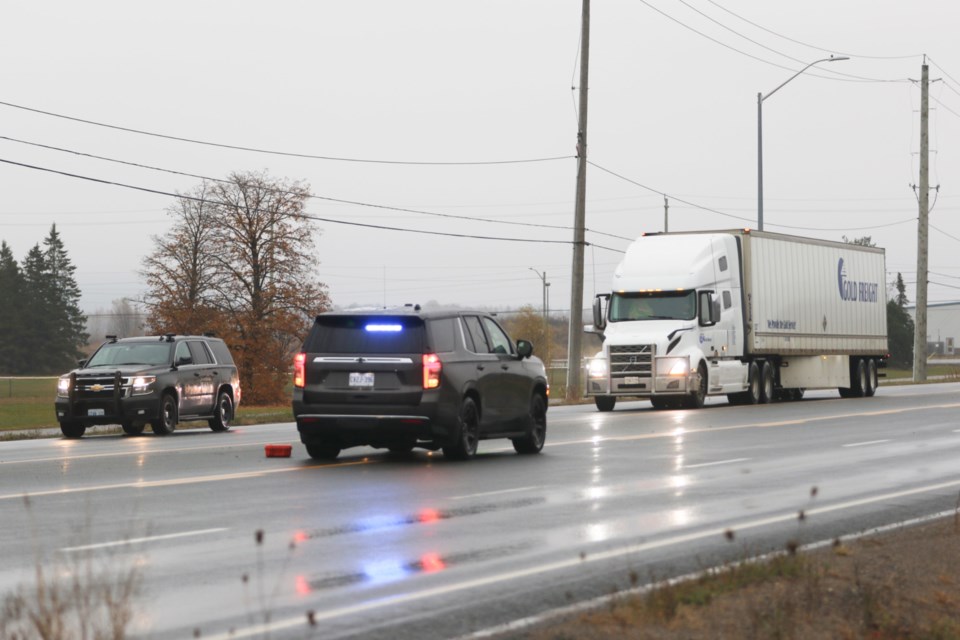 Police and MTO Commercial Vehicle Enforcement were seen inspecting commercial vehicles on Second Line East Tuesday morning