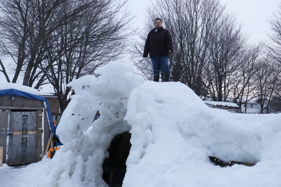 Brody Buckner built this igloo in the Cambridge Place neighbourhood. Buckner, who lives with multiple sclerosis, built it for his two kids and as a way to get out of the house. James Hopkin/SooToday