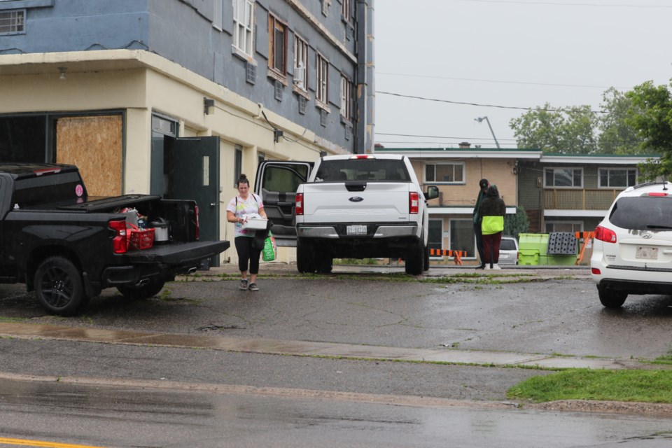 People were on hand to assist tenants in moving their personal belongings out of 138 East Street after the city slapped an Unsafe Order on the building earlier this week.  