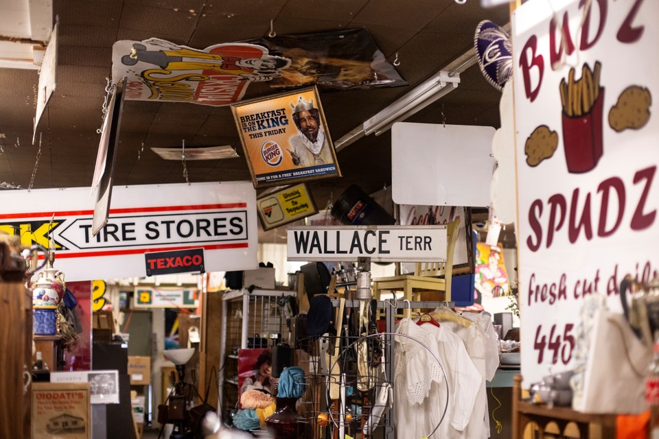 Old signs from local businesses are among the items that will be on the auction block this weekend as the new owner of the building at 288 Korah Rd. prepares the space for some new plans.