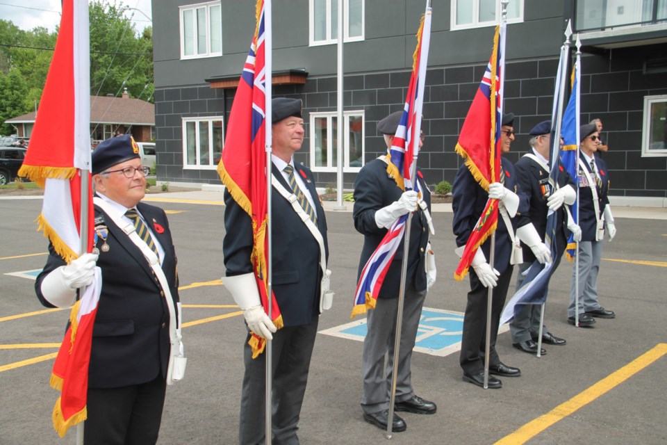Royal Canadian Legion Branch 25 and members of the public observed the 80th anniversary of D-Day outside Branch 25’s new office and apartment complex on Great Northern Road, June 6, 2024.