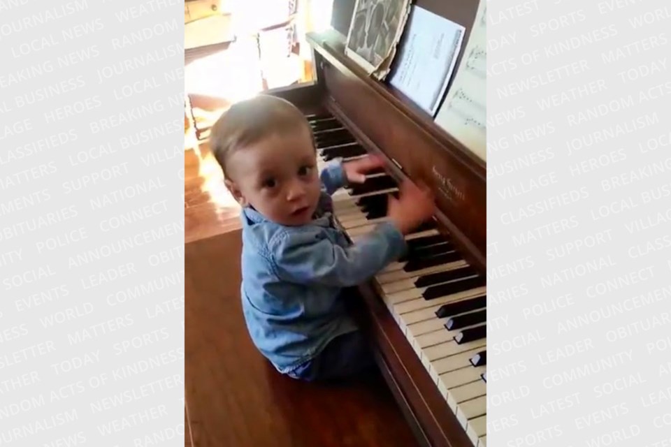 78 years after Dorothy Bianchi received this Henry Herbert piano as a gift on her 10th birthday, the instrument is being prepared for new life as a public piano on Queen Street. Bianchi’s grandson Calvin is shown making his first attempt to play the upright, which was made in Toronto by Mason and Risch