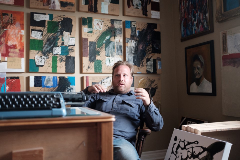 Local artist Chris Shoust in his studio. With his work, Shoust hopes to create a dialogue about mental health issues. Shoust's artwork was recently used in M. Night Shyamalan's 2016 film 'Split'.  Jeff Klassen/SooToday