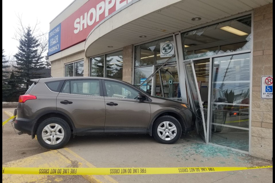 A vehicle crashed into the front of Shoppers Drug Mart on Second Line.