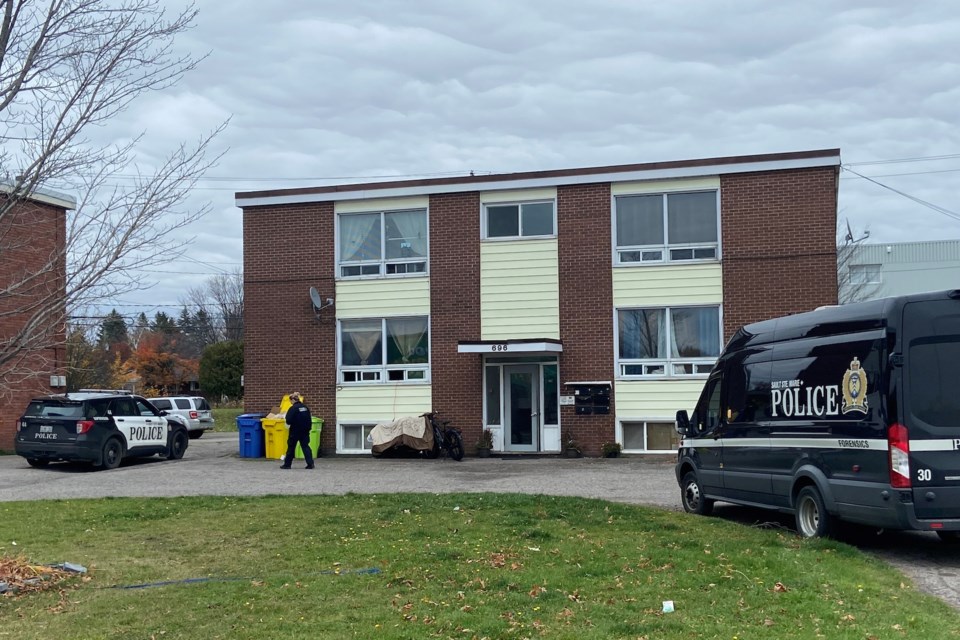 Heavy police presence seen at an apartment building on Pine Street on Tuesday, Oct. 25, 2022