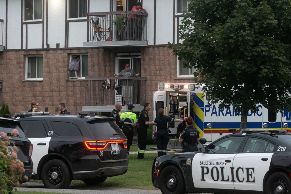 At least four units from the Sault Ste. Marie Police Service responded to a call for service at an apartment building at 115 Cambridge Place on Sunday evening. Paramedics took one person to hospital by ambulance.