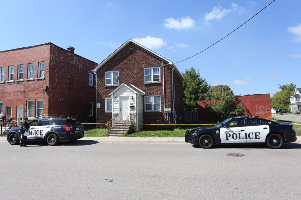 A house at John Street and Cathcart Street remained taped off for a police investigation Friday afternoon.