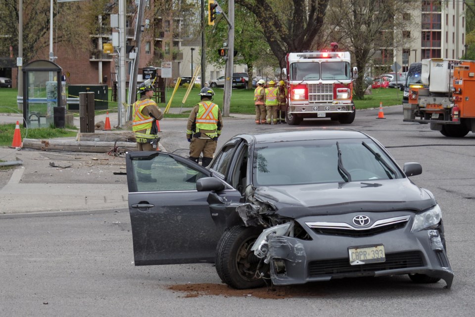 A car plowed into a telephone pole, closing Bay Street. Michael Purvis/SooToday