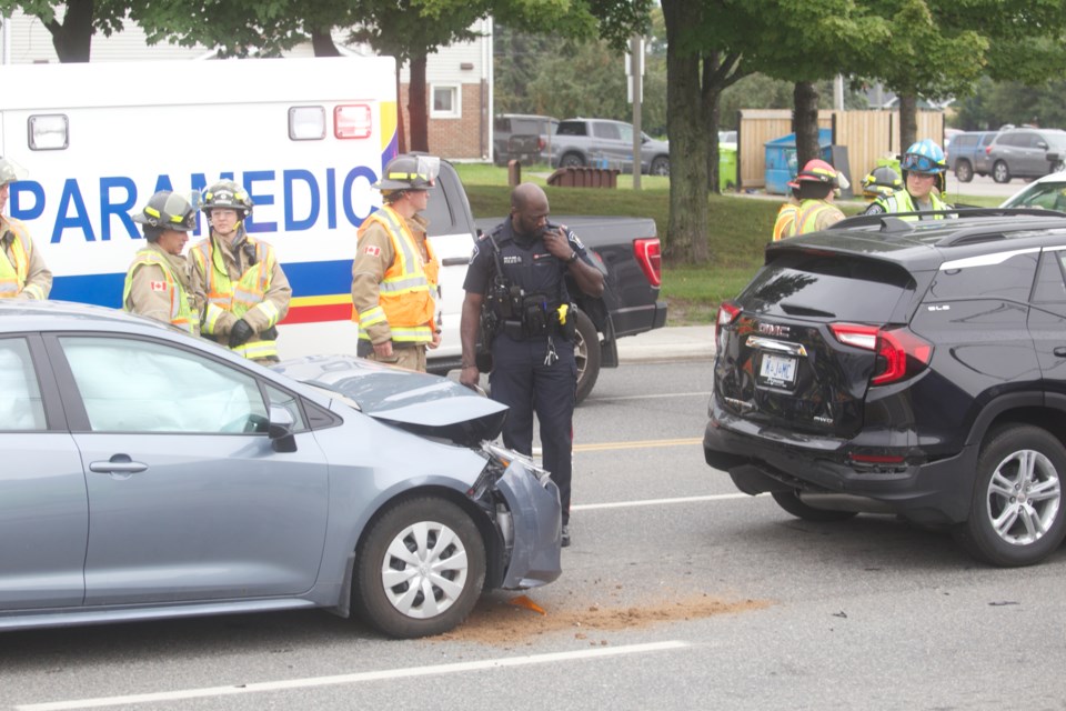 Police and emergency services respond to a collision on McNabb Street near the YMCA on Thursday, Aug. 24, 2023.