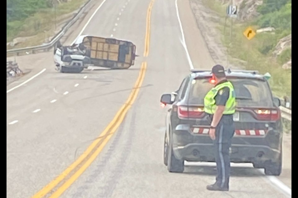 Scene of mishap on Highway 17 north of the Sault involving an SUV towing a trailer