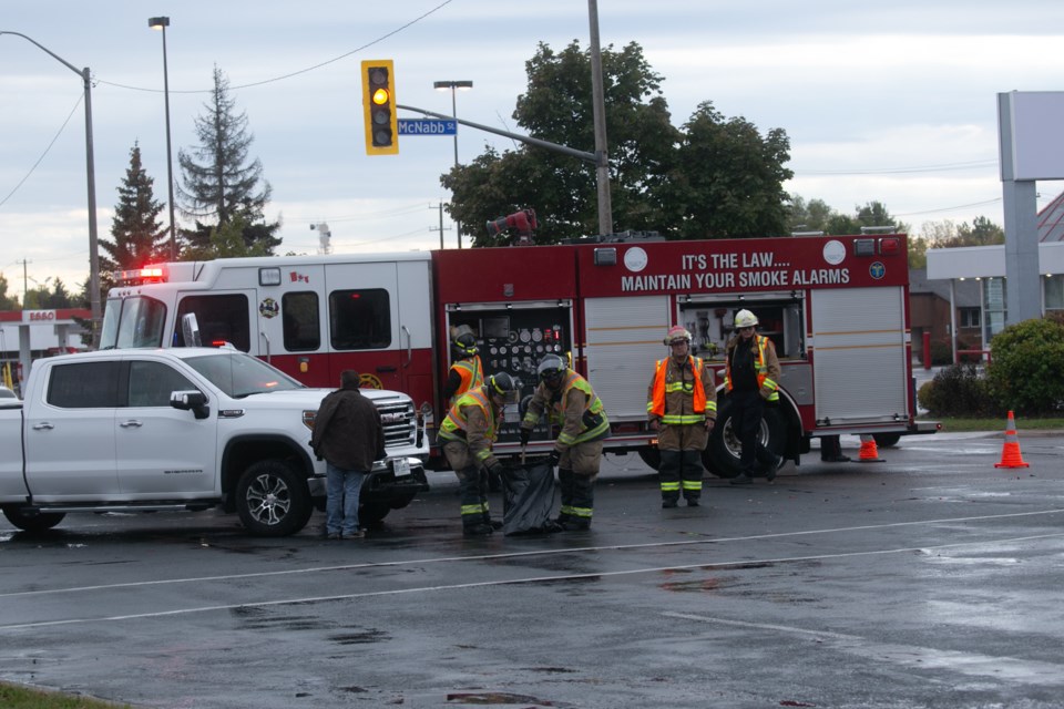 Emergency crews respond to a crash at Great Northern Road and McNabb Street on Monday afternoon.