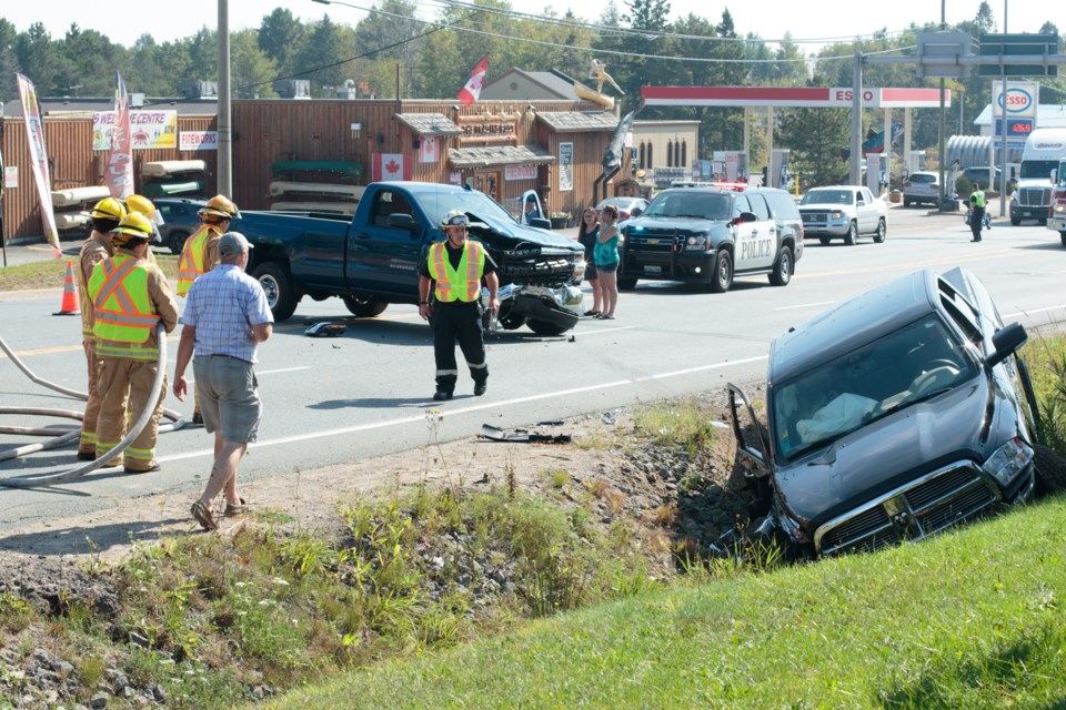 A blue Chevy Silverado and black Dodge Ram collided on Great Northern Road in front of the Trading Post at around 2 p.m. on Saturday said Sault Ste. Marie Fire Services Captain Rob Greve. Jeff Klassen/SooToday