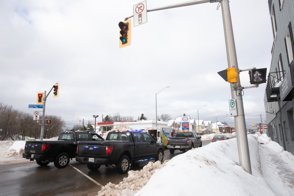 Sault Police closed Wellington Street West immediately west of John Street for a time on Sunday while paramedics treated a man on scene.