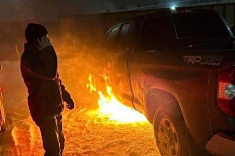 Bystanders tried to put out the weekend fire near Algoma Steel’s No. 1 gate by kicking snow on it.