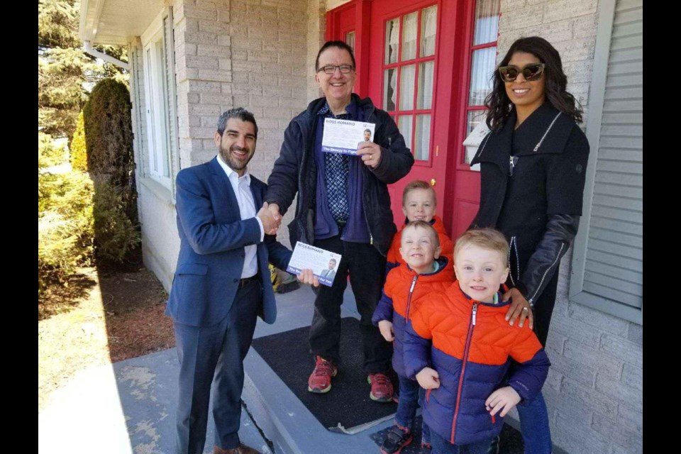 Ross Romano and family with Andy Martens in front of Romano's newly opened campaign headquarters. Submitted photo