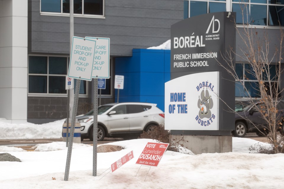 Election signs seen Tuesday in front of Boreal French Immersion Public School. The school will act as a polling station on Thursday and the signs out front have since been removed.