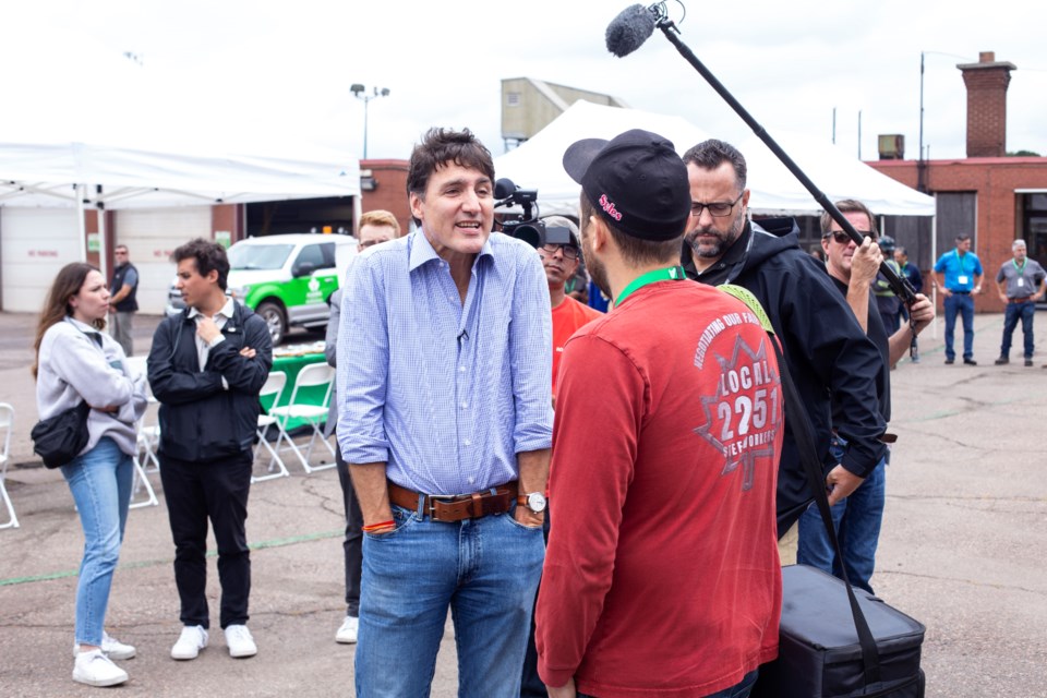 Prime Minister Justin Trudeau shrugs as he unsuccessfully attempts to win over a steelworker during a contentious exchange at a meet and greet with Algoma Steel workers in Sault Ste. Marie on Friday, Aug. 30, 2024. THE CANADIAN PRESS/Kenneth Armstrong