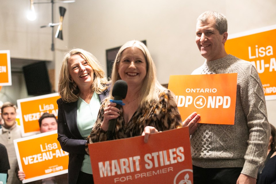 Lisa Vezeau-Allen, Ontario NDP nominee for the riding of Sault Ste. Marie, speaks to a crowd of supporters as party leader Marit Stiles and Algoma-Manitoulin candidate David Timeriski look on.