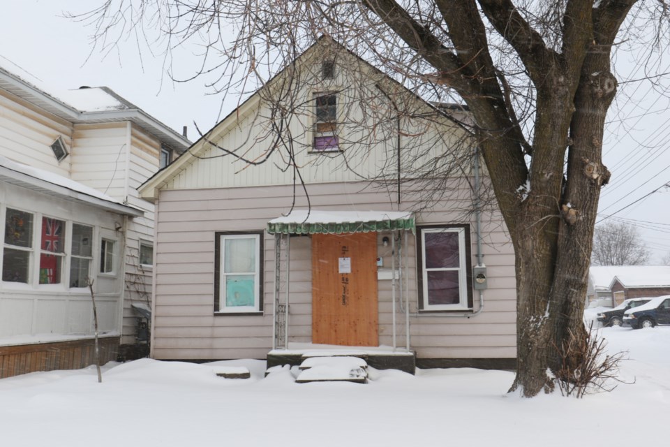 A vacant, boarded-up property at 216 Gloucester St. has been named in a civil suit against CPM Properties co-director Nels Moxness for alleged non-payment of a $160,000 loan. 