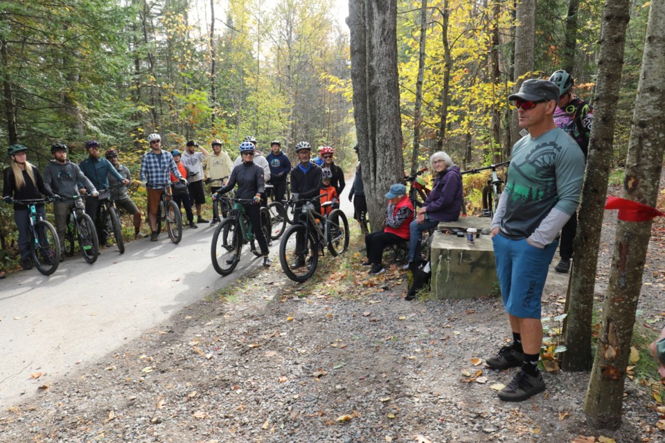 Sault Cycling Club Advocacy Director Andre Riopel, right, provides a few words to cyclists prior to Saturday's ribbon-cutting event. 