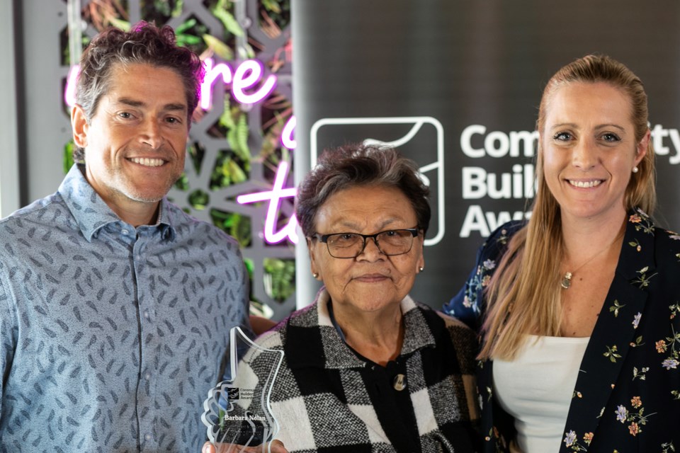 Barbara Nolan accepts her 2024 SooToday Community Builders Award for Education from award sponsors Paul Spina and Michaela Carrau Van Der Weck from Tenaris. / Kenneth Armstrong