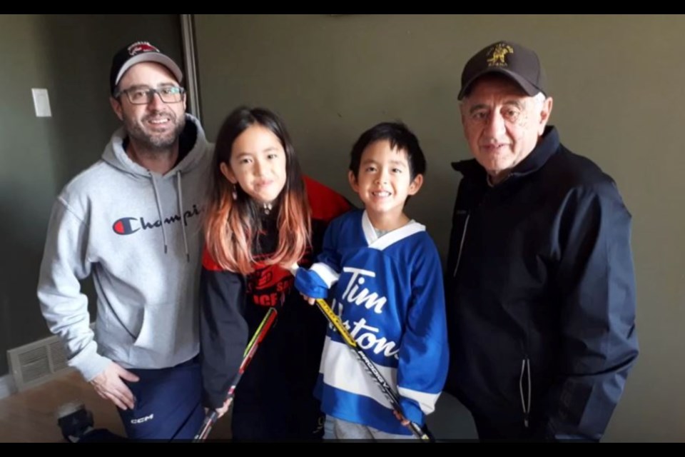 Joe Longo, right, has been honoured by the Ontario Hockey Federation as the latest recipient of the Sam Ciccolini Volunteer of the Year award.